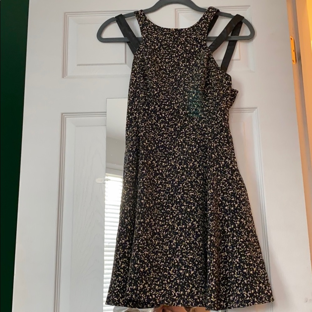 Unique jacquard dress with faux leather straps